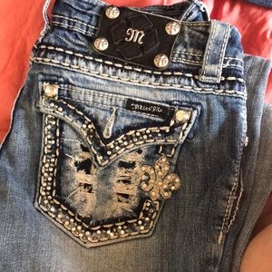 Distressed pocket bootcut miss me jeans